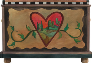 Chest with Drawer – Beautiful heart with wings floating in a landscape with a twisting vine on its lid and patchwork motifs on the sides back view