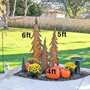 Tall Pencil Tree Sculpture – These showstopper tree sculptures would look perfect alone or grouped at your front door, within your landscaping, near the fireplace, or as a Christmas card display during the holidays - so versatile! displayed in a yard