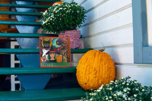 "Trick or Treat" Plaque – Spooky cute Halloween themed plaque motif displayed with mums and pumpkin