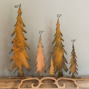 Pencil Tree Sculpture – Tall, thin pine tree sculptures that look best as a grouping but a single one will still look great with other mementos you have at home with sizes