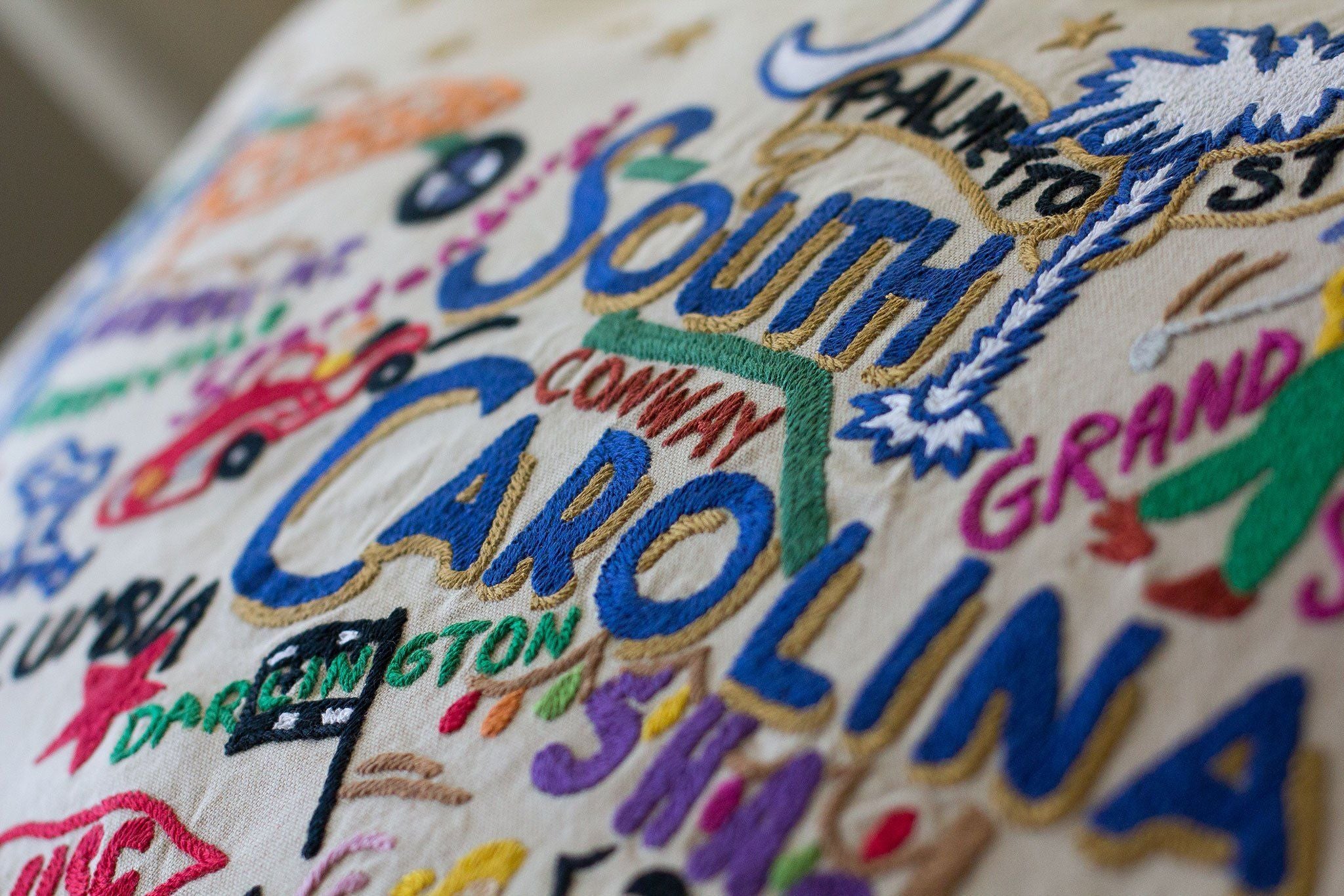 South Carolina Hand-Embroidered Pillow -  From the Atlantic Ocean to Sassafras Mountain - this original design celebrates the great State of South Carolina!